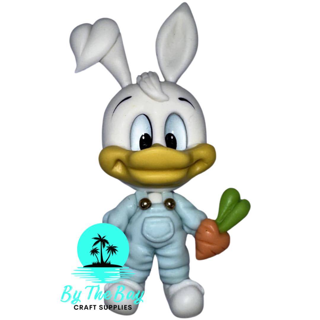 Duckie with blue overalls