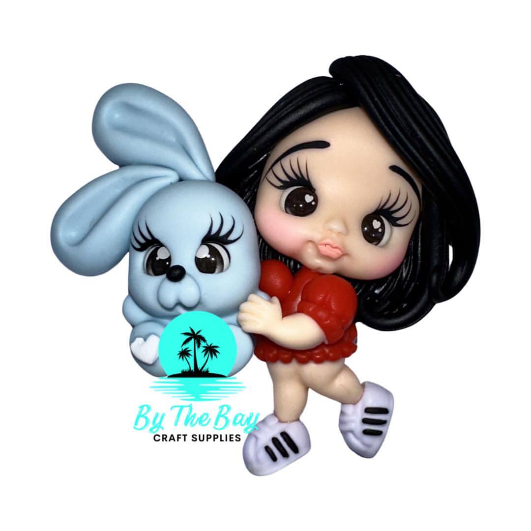 Dark hair girl with blue bunny
