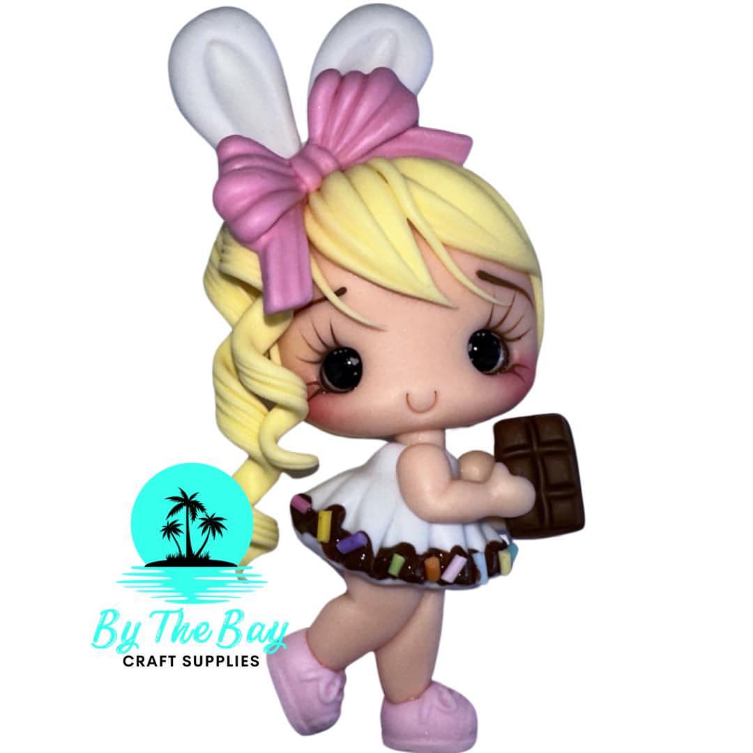 Chocolate dress girl with chocolate bar