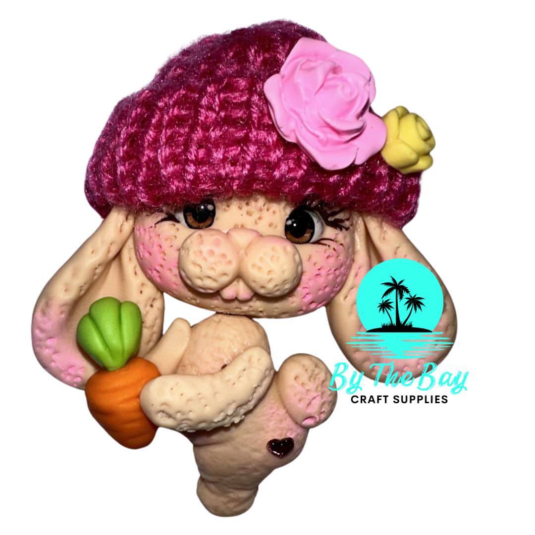 Bunny in beanie with carrot