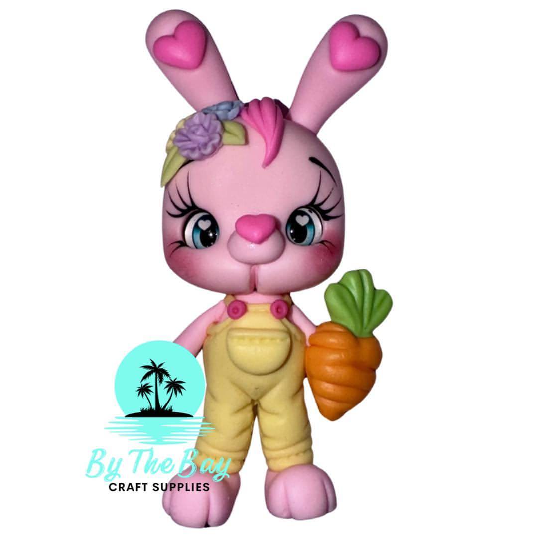 Pink bunny yellow overalls