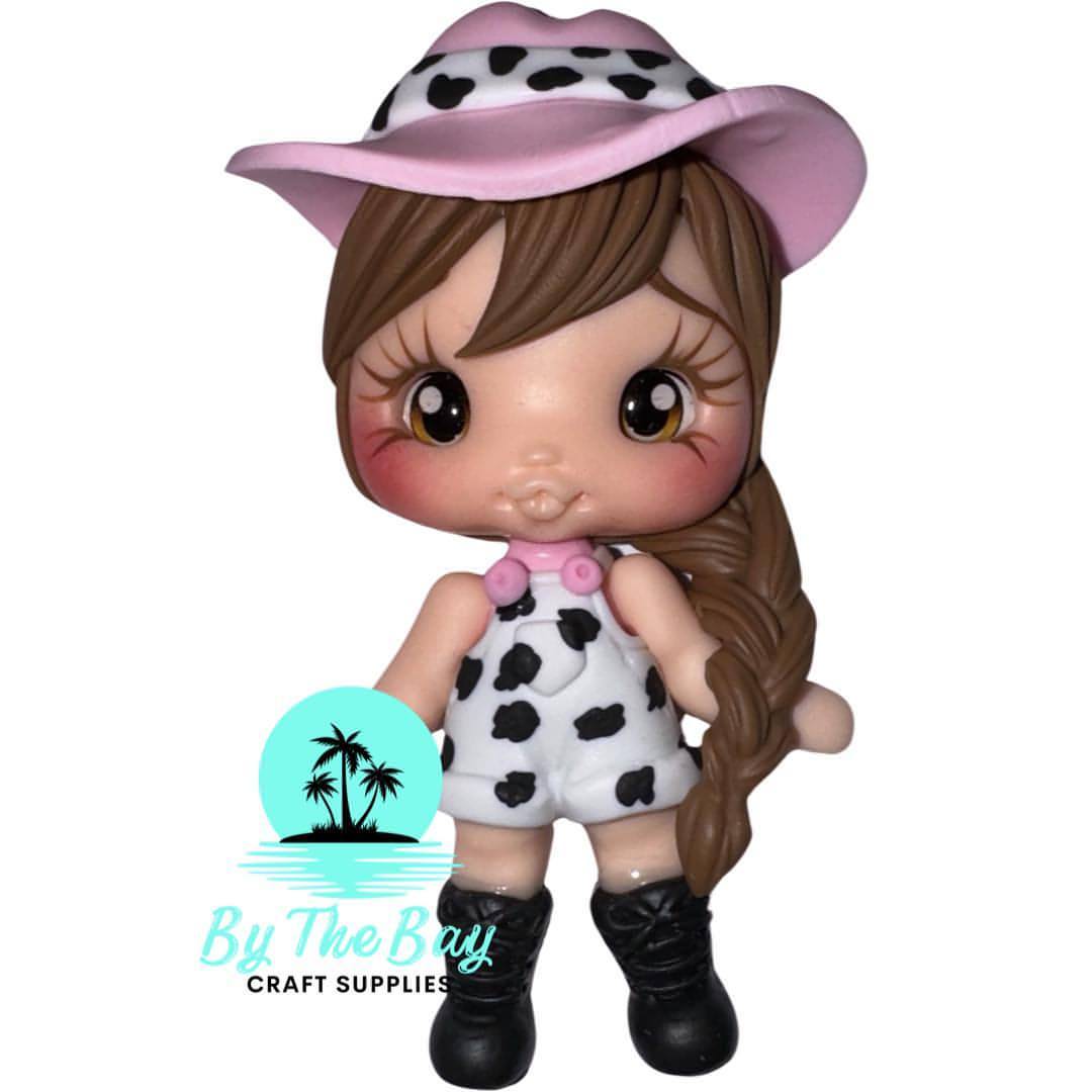 Girl with cow overalls