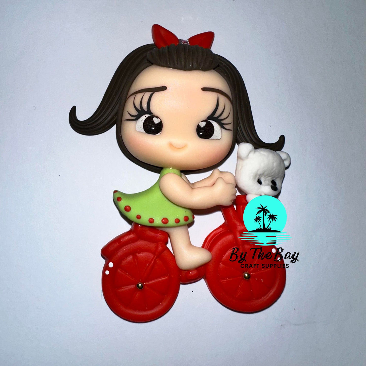 Christmas girl on a bike