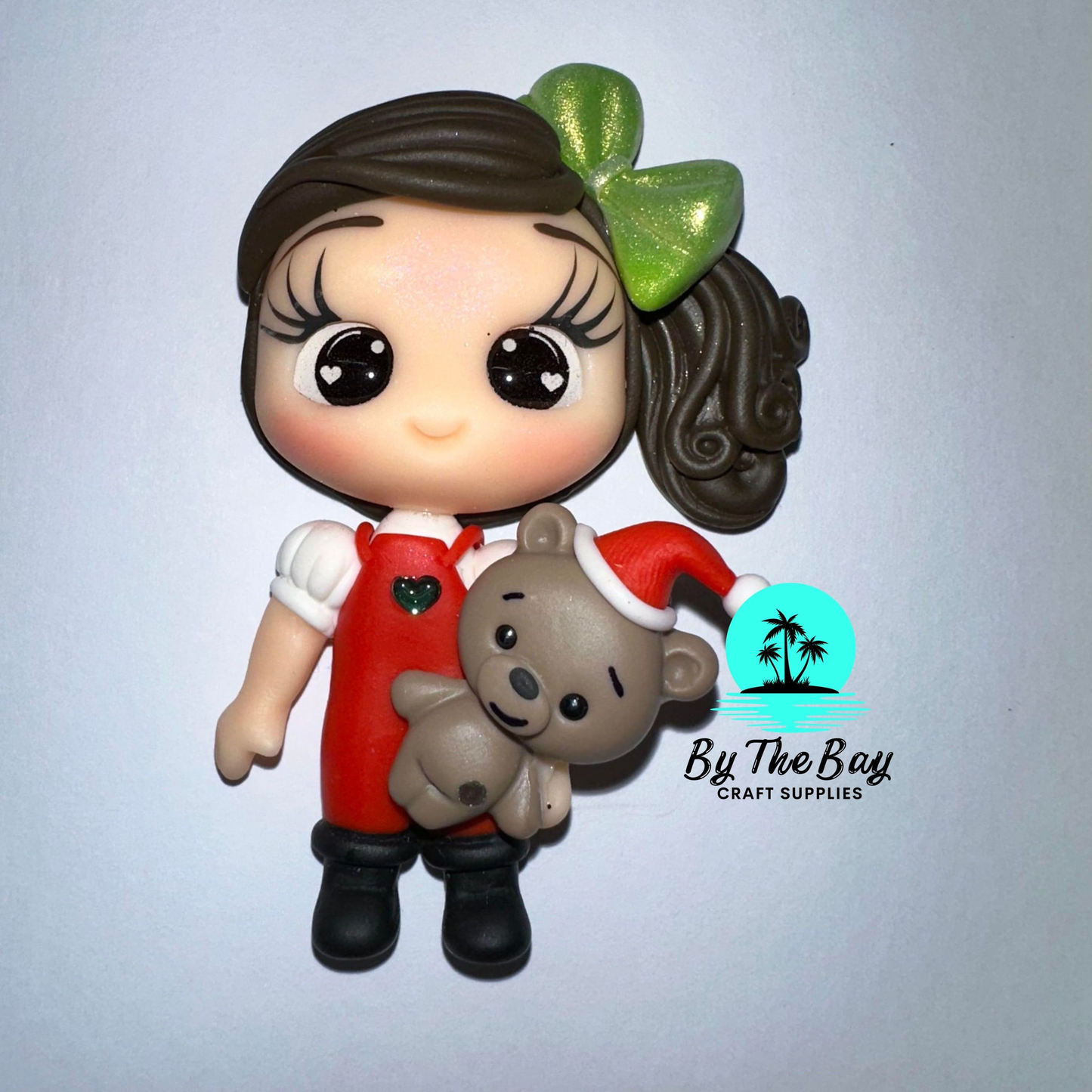 Girl with cute Santa bear