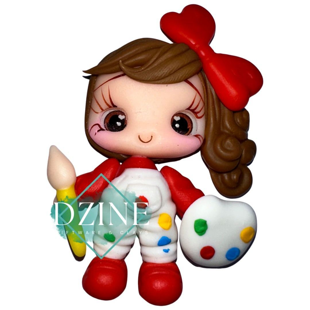 Cute artist in white overalls