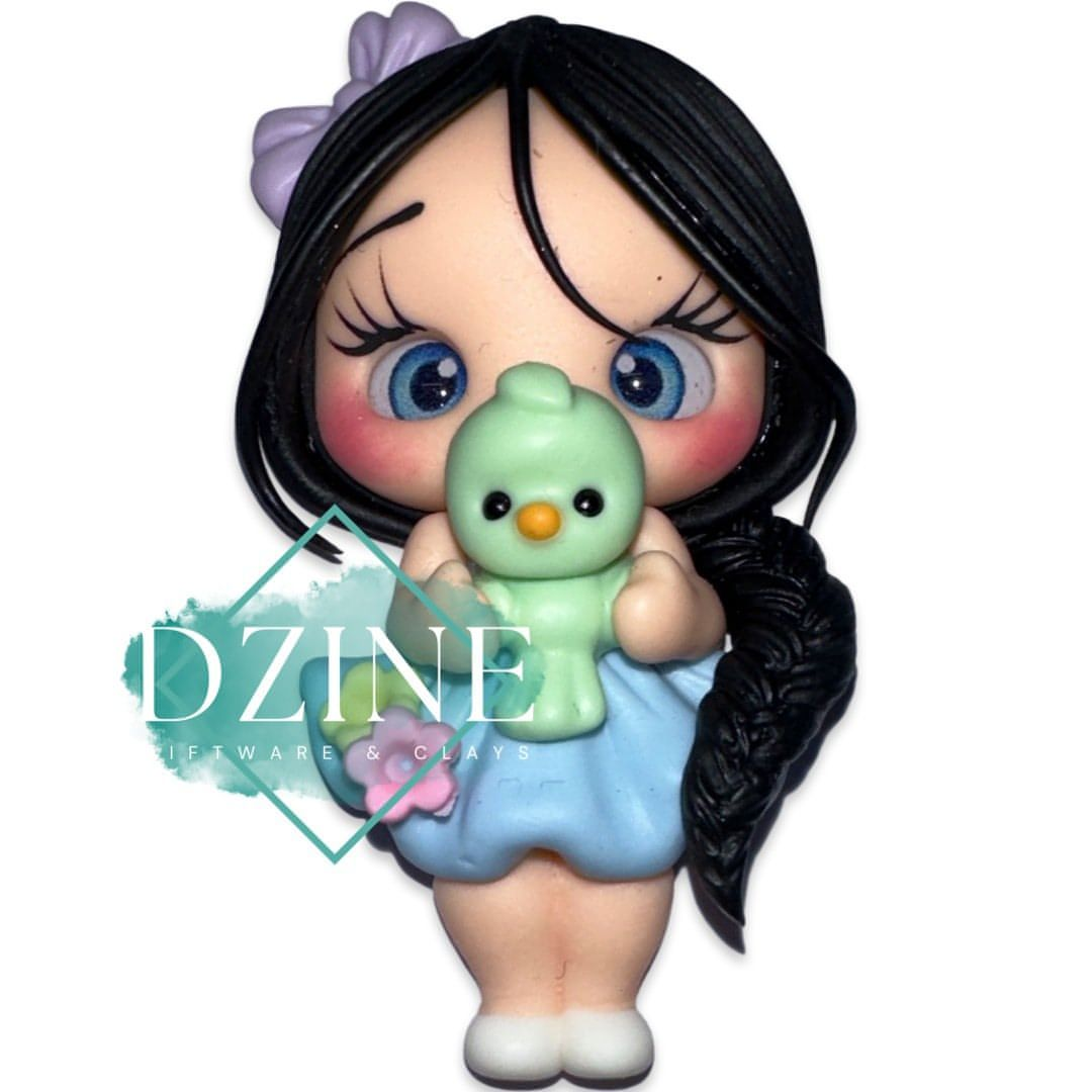 Cute girl with green bird