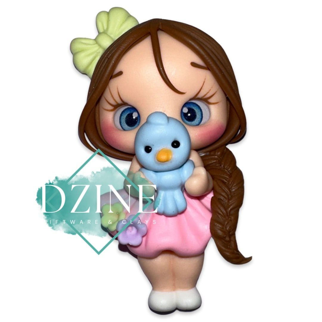 Cute girl with blue bird