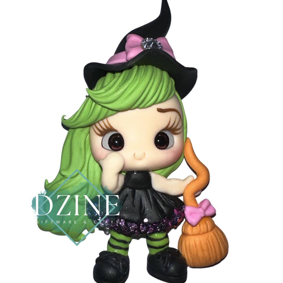 Cute green haired witch