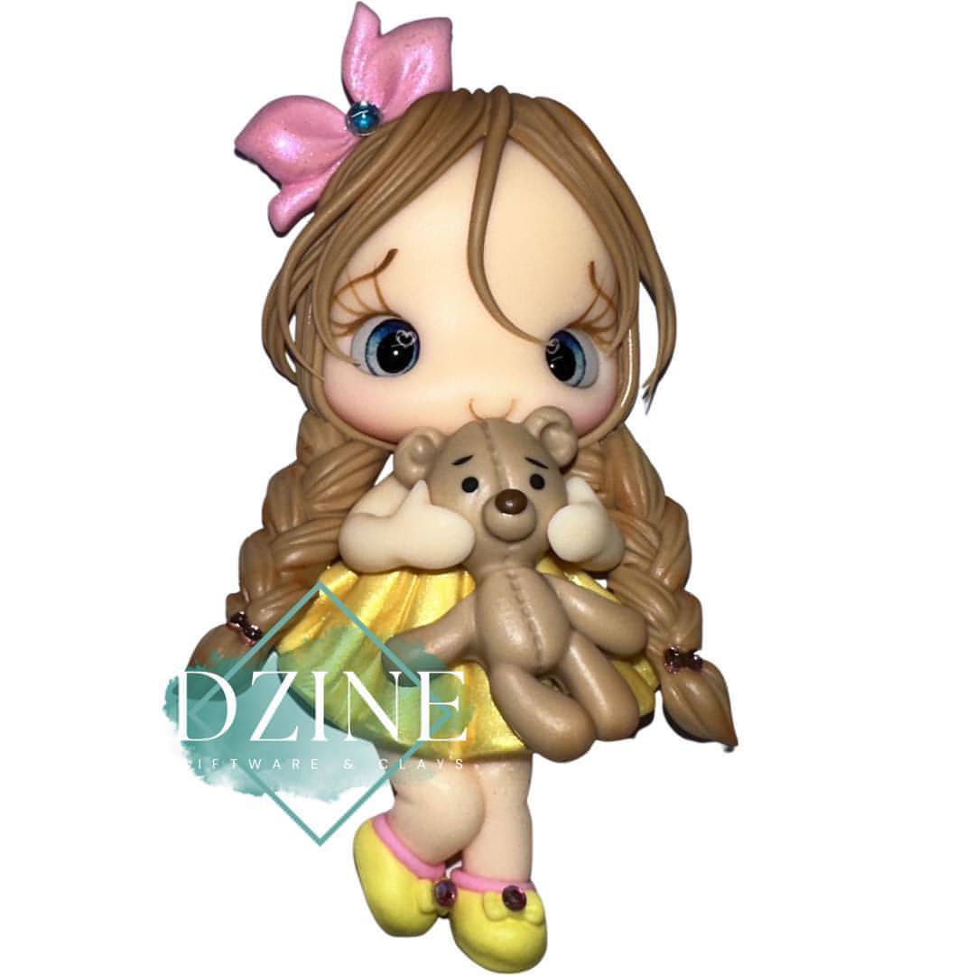 Cute girl with yellow dress & teddy bear