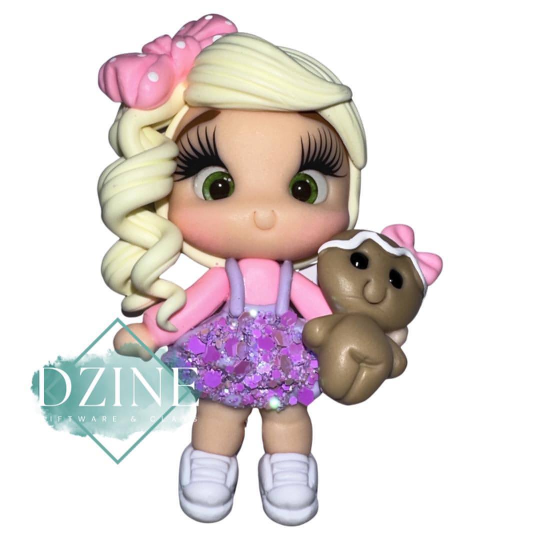 Christmas girl in purple glitter pinafore