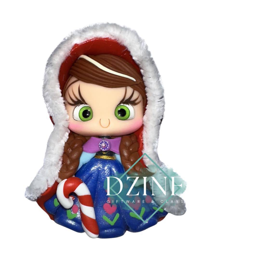 Christmas brunette snow princess wearing fluffy cape