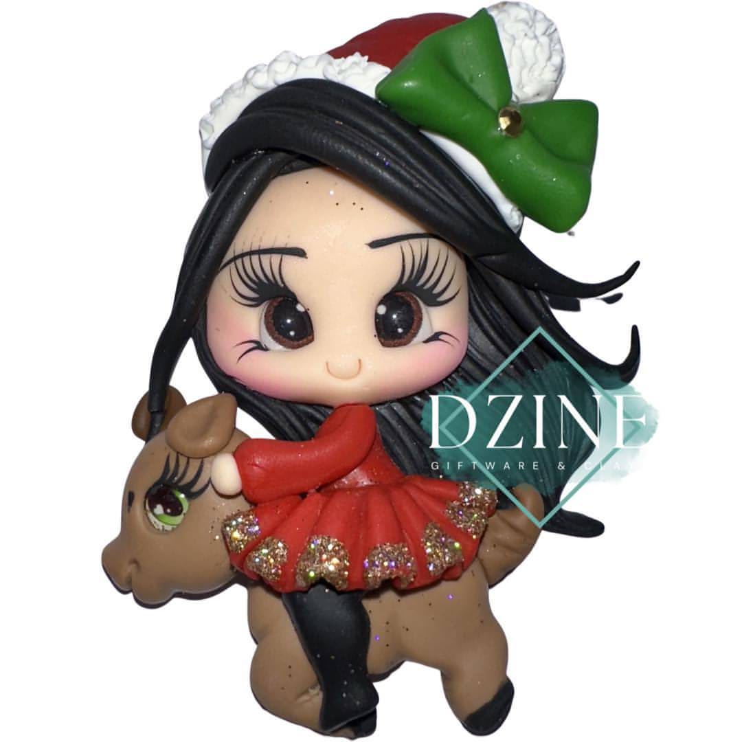 Christmas girl on reindeer with black hair