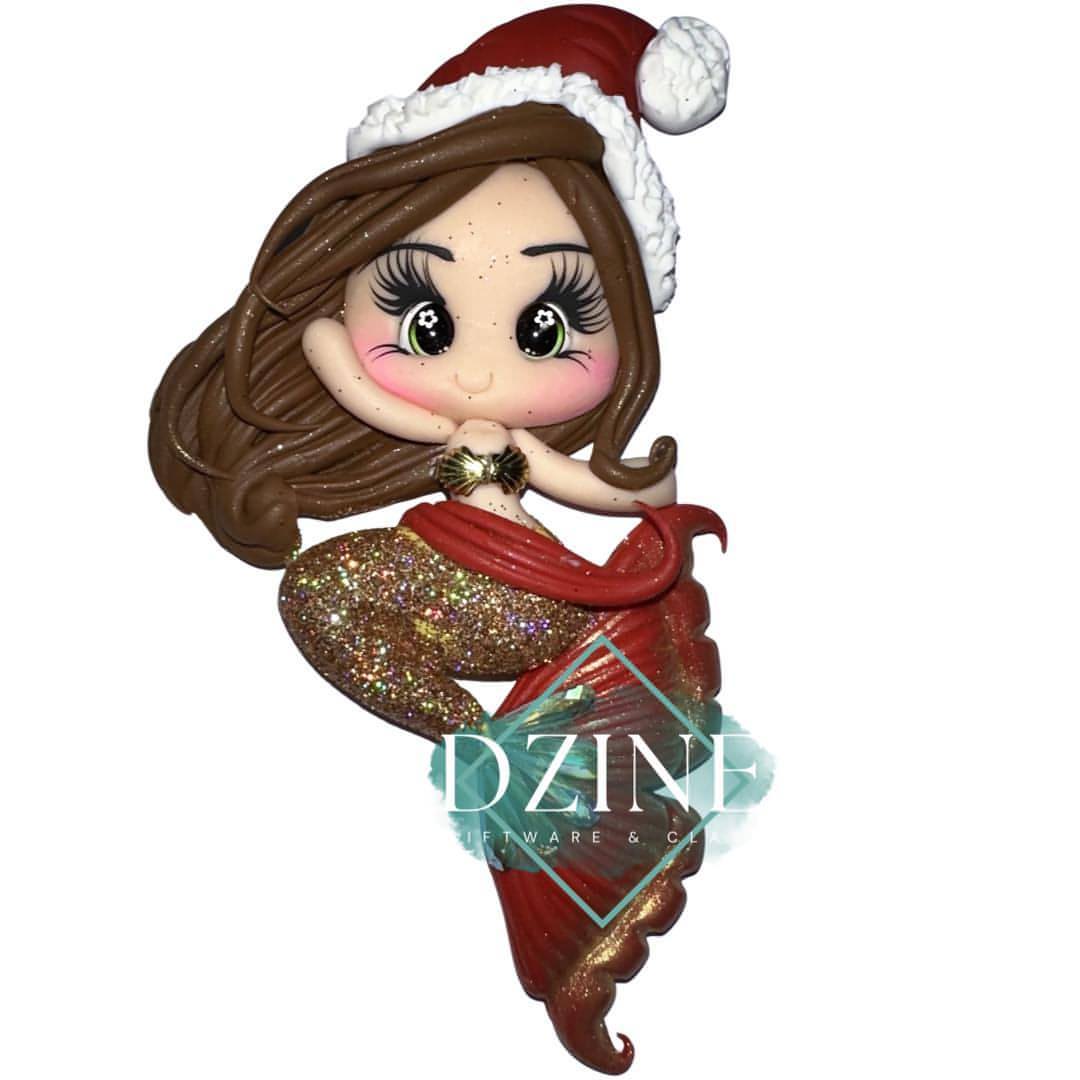 Christmas mermaid with gold glitter tail