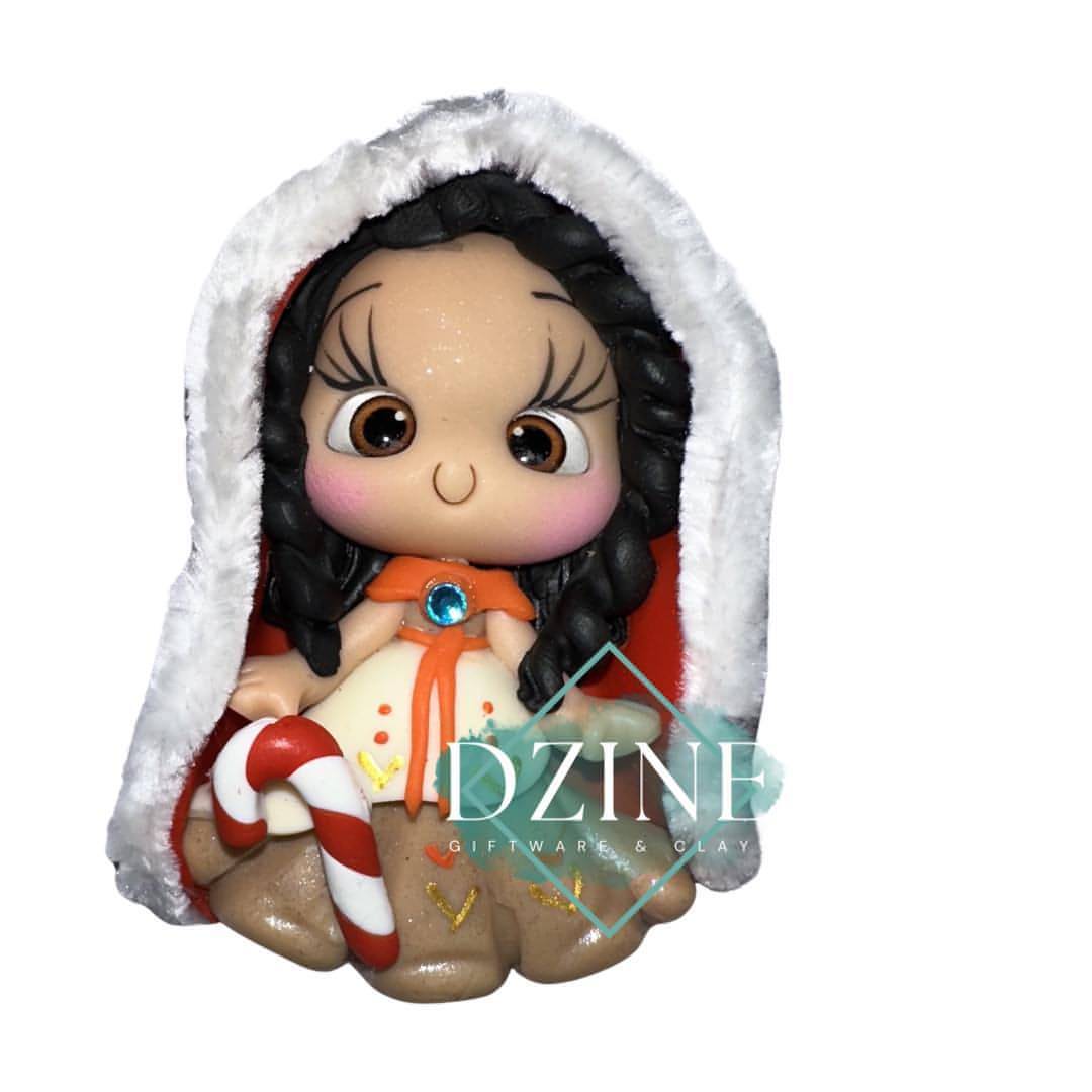 Christmas island princess wearing fluffy cape