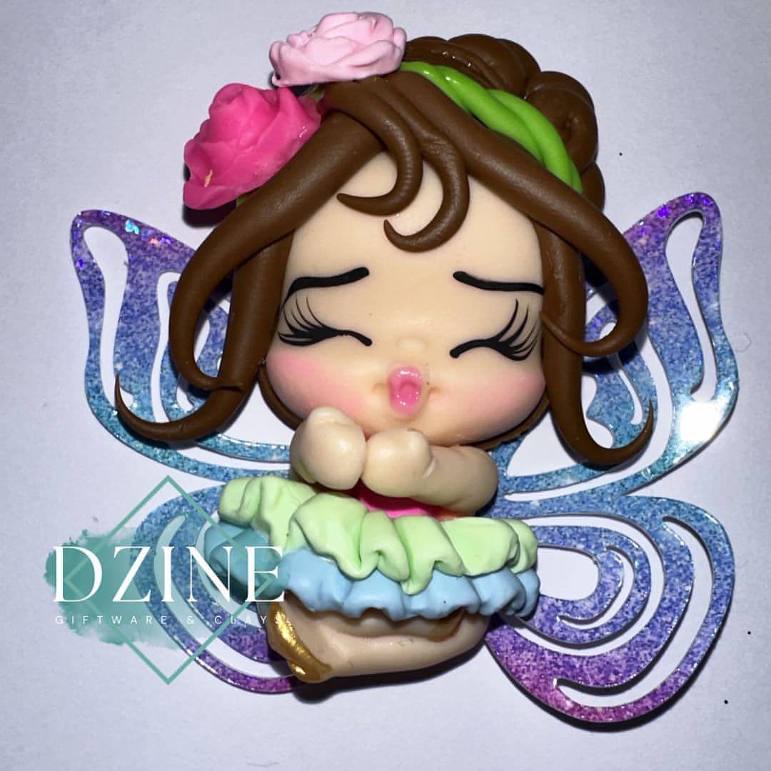 Fairy with blue and green skirt