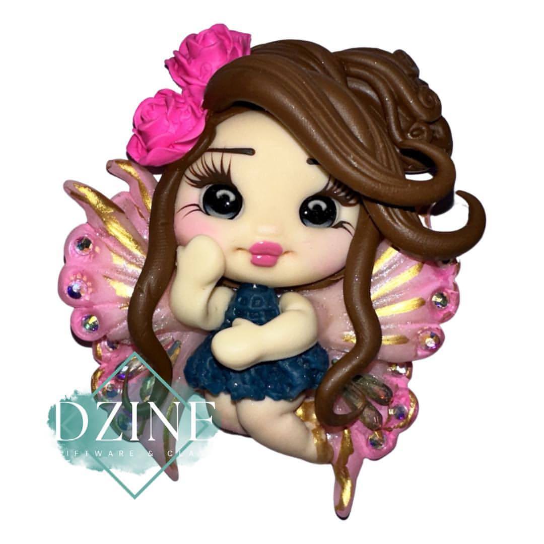 Fairy with peach clay wings