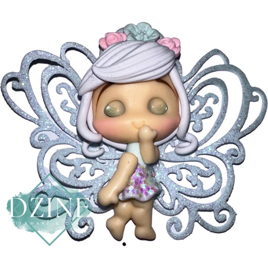 Fairy pastel blue with eyes closed