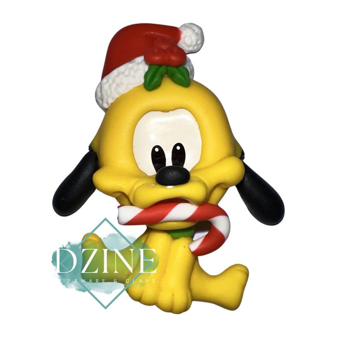 Christmas yellow dog with candy cane