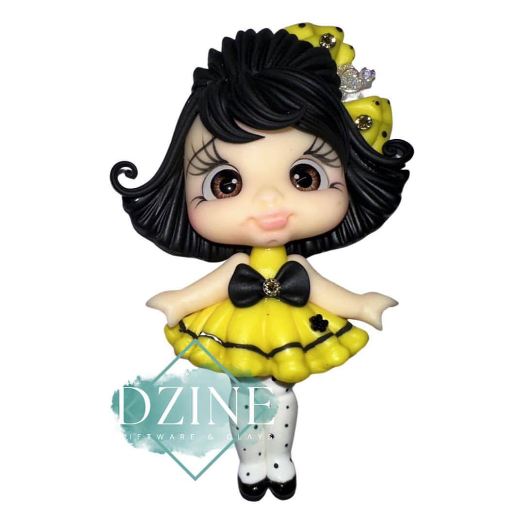 Cute girl in yellow dress & polka dot stockings