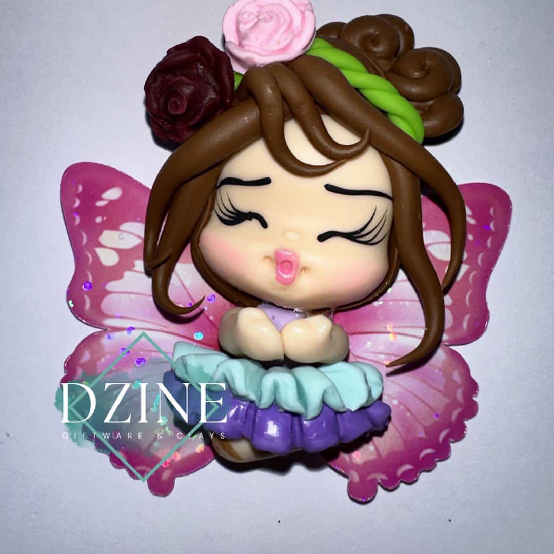 Fairy with purple and blue skirt