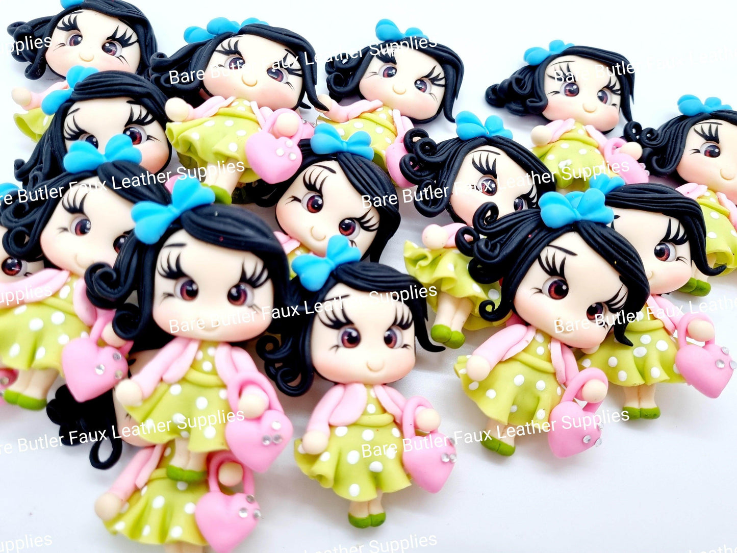 Girl in Green Polk a dot dress with Pink Purse - Clay, Clays - Bare Butler Faux Leather Supplies