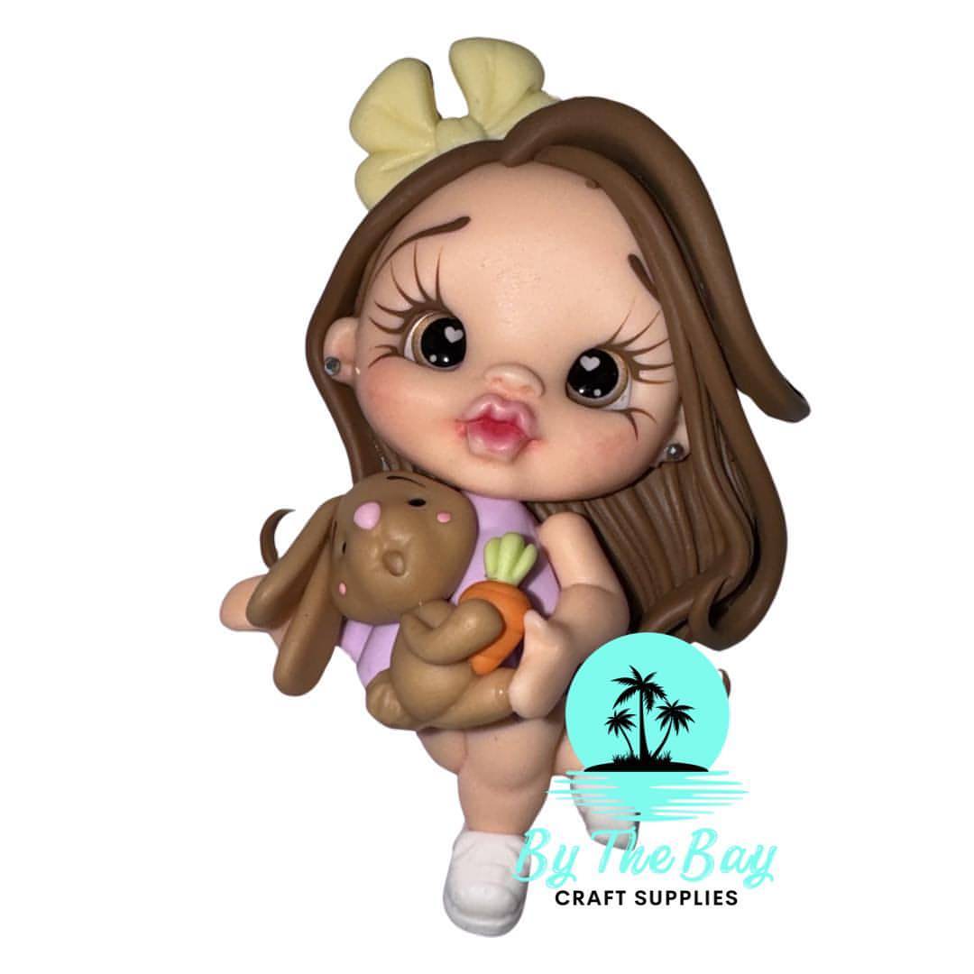 Easter girl with brown bunny mini carrot