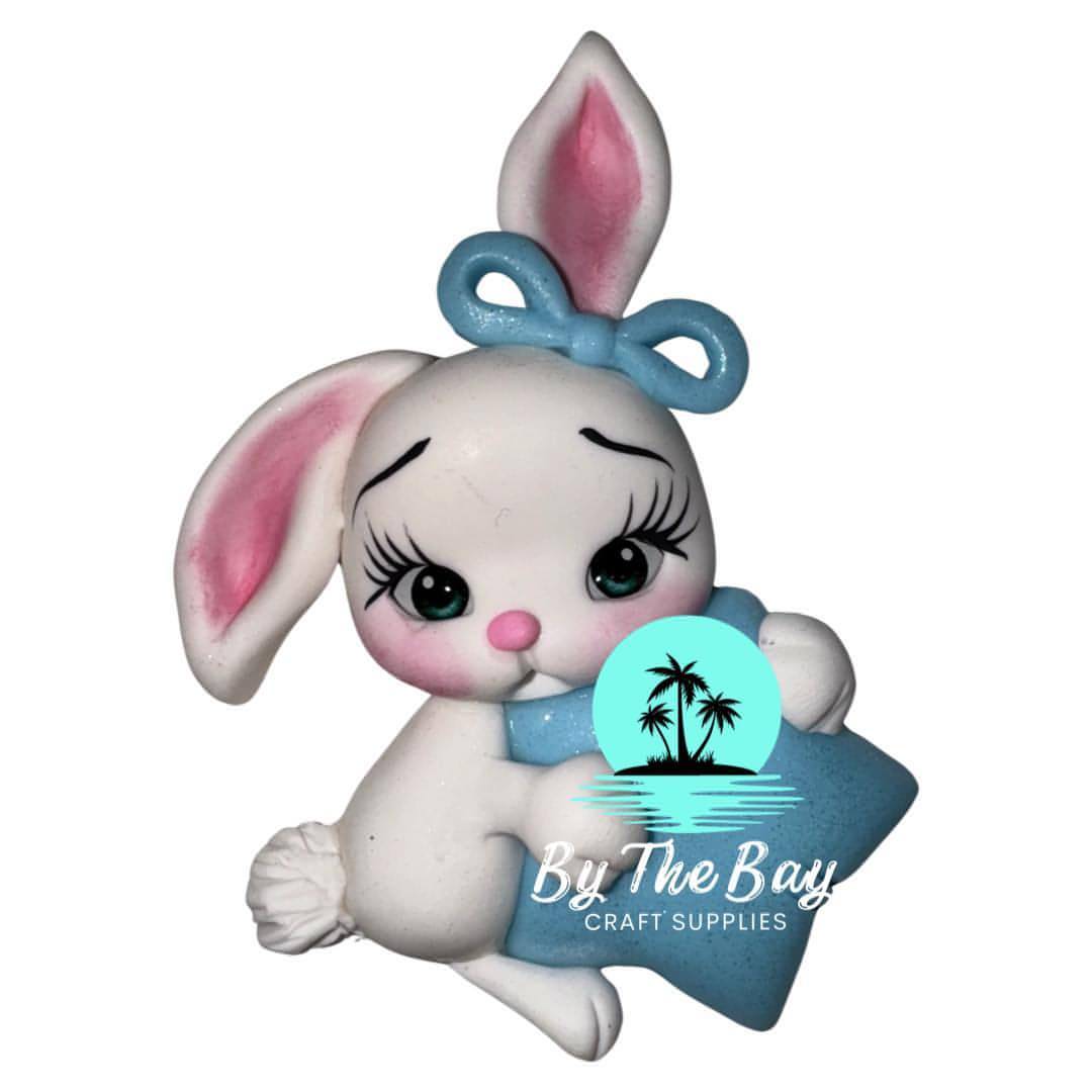 White bunny blue star