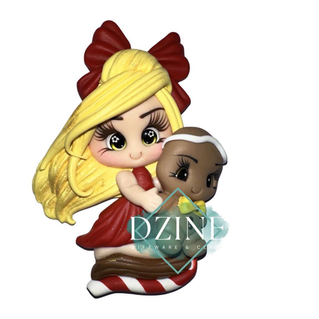 Christmas girl with gingerbread man