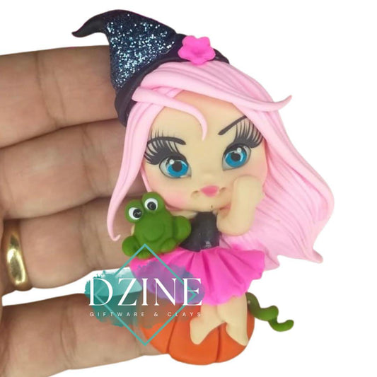 Witch on pumpkin with pink hair
