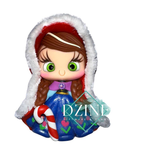 Christmas brunette snow princess wearing fluffy cape