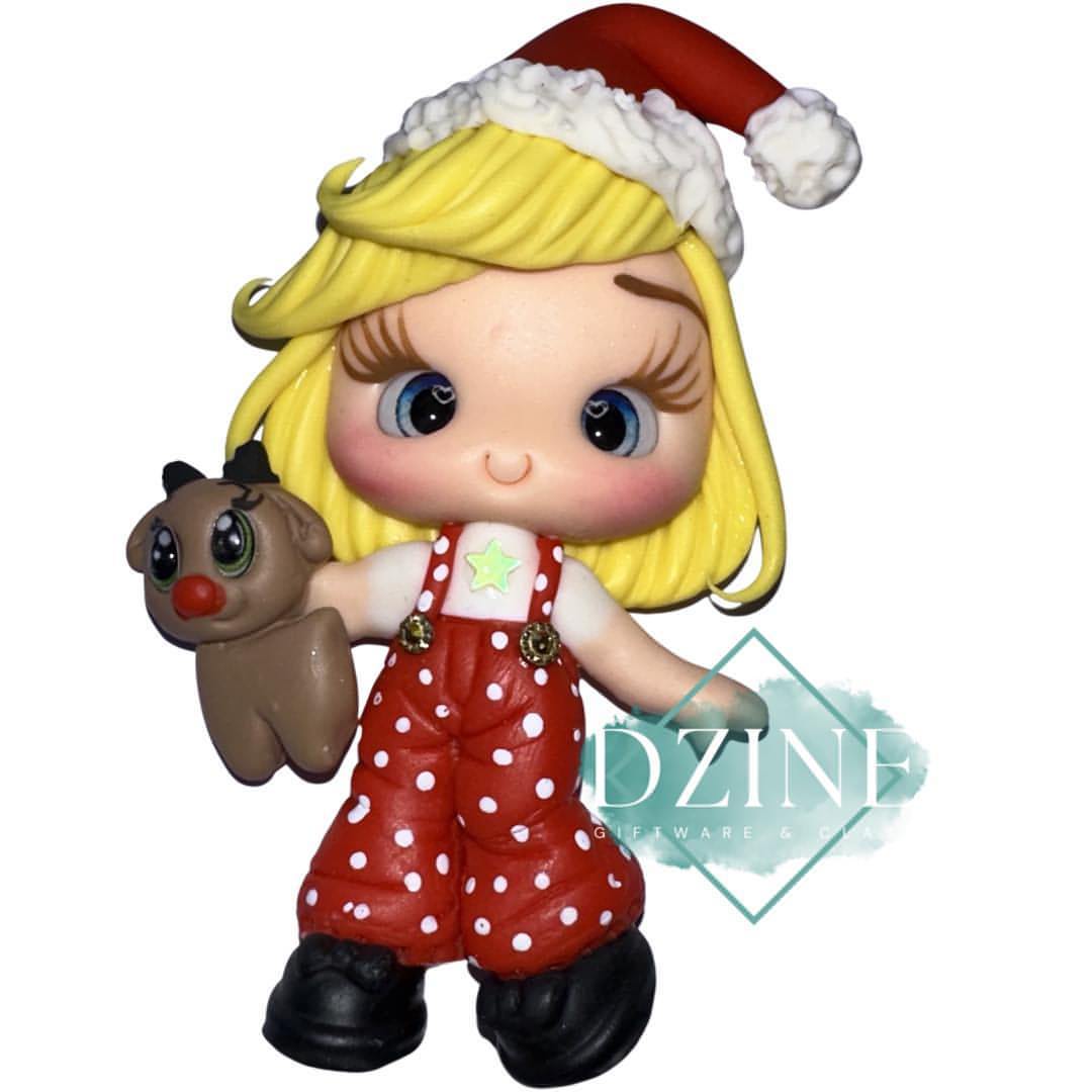 Christmas girl in polka dot overalls