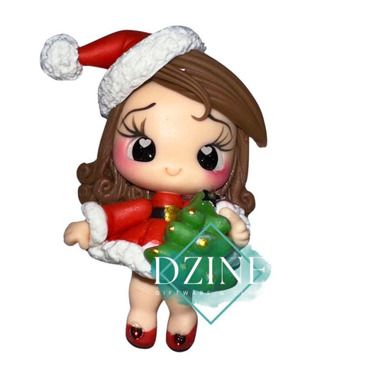 Christmas girl holding christmas tree