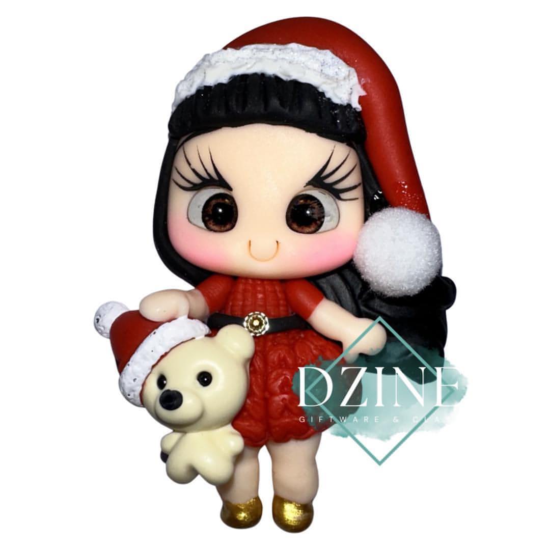 Christmas girl with fluffy pom pom