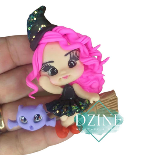 Pink witch on her broom