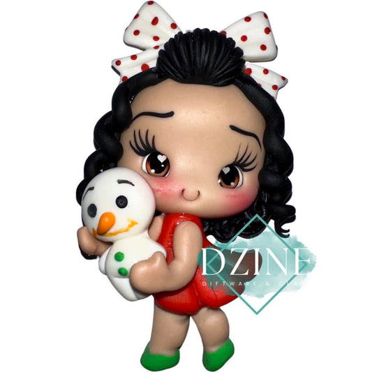Christmas girl with snowman wearing polka dot bow