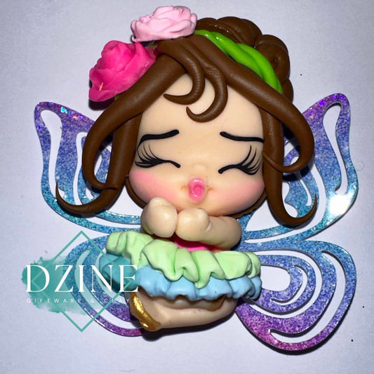 Fairy with blue and green skirt