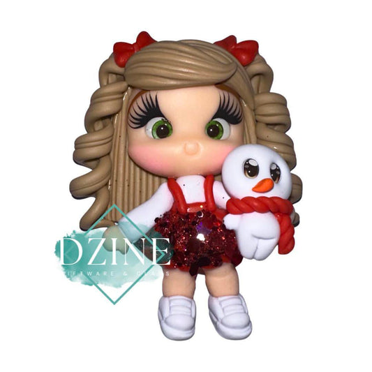 Christmas girl in red pinafore with snowman