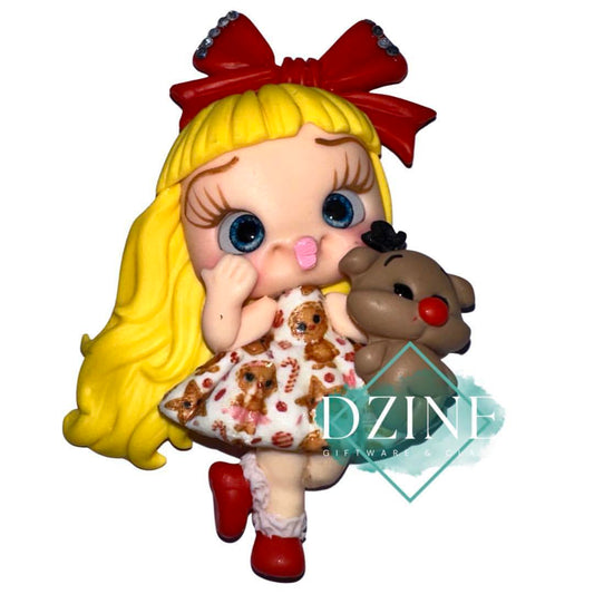 Christmas girl in reindeer dress with reindeer blonde hair