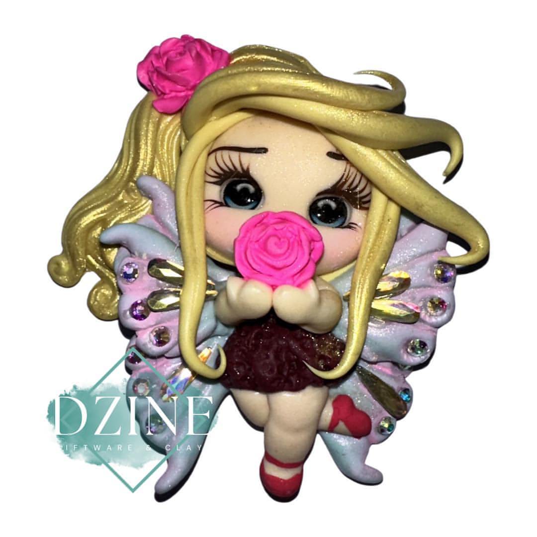 Fairy with blue clay wings