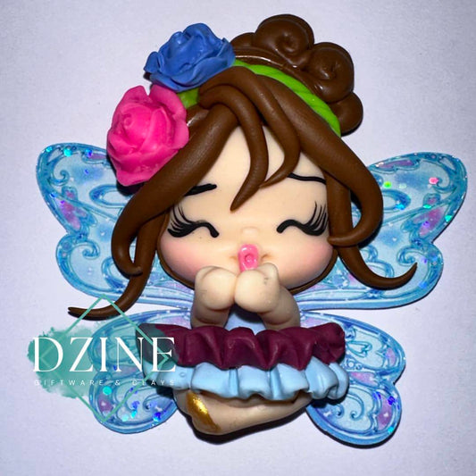 Fairy with blue and maroon skirt