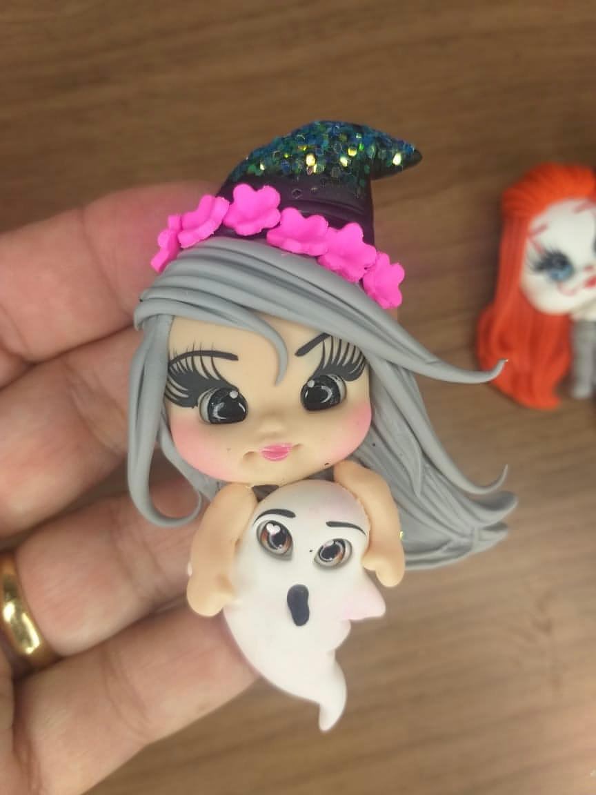Cute witch and ghost