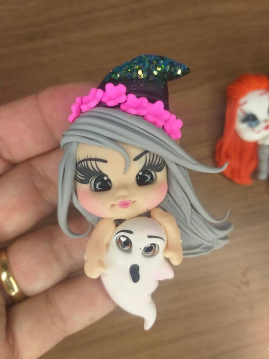 Cute witch and ghost